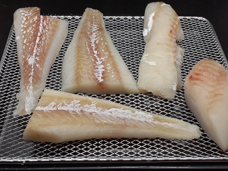 Drying Cod Fillets on a Rack