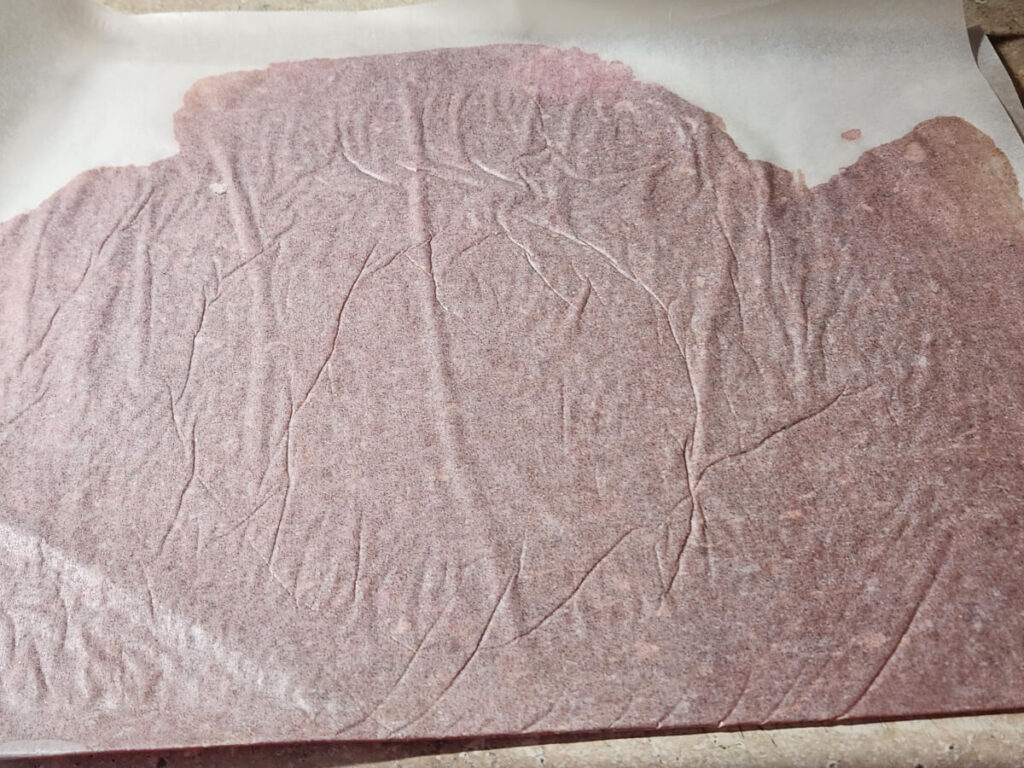 JAHZKITCHEN Donair Meat Rolled out thin between Parchment Paper