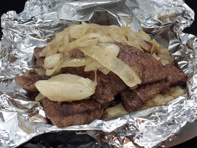 Liver and Onions stacked in tin foil