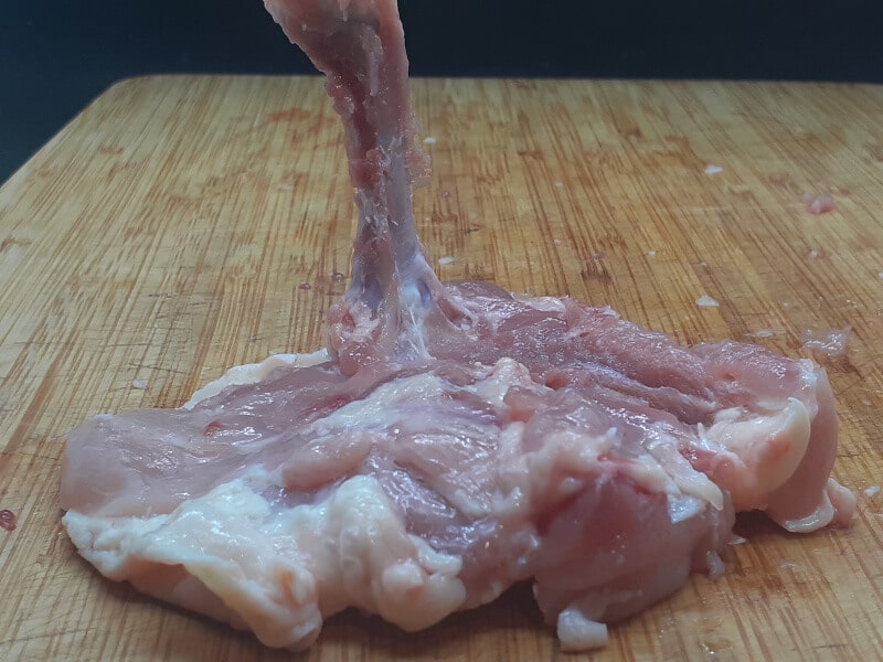 Chicken Thigh Bone scraping the meat and removing the bone