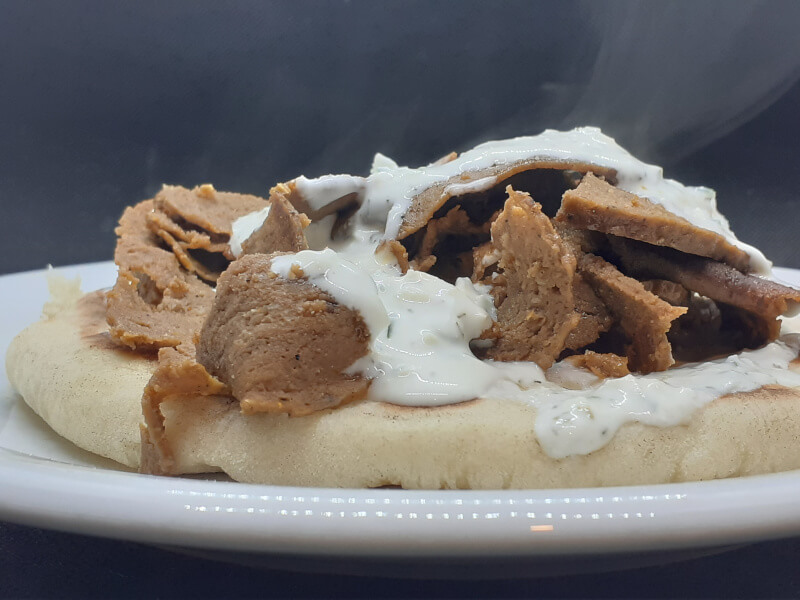 Donair meat on Greek Pita BRead with Tzatziki
