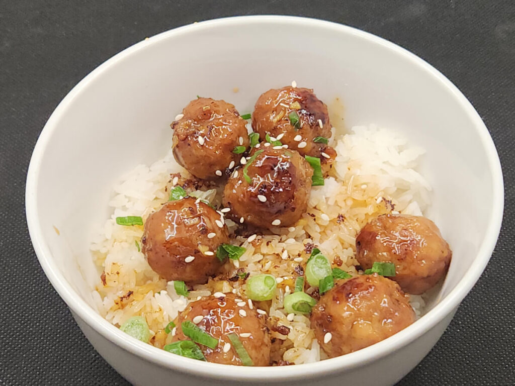 Bowl of Honey Garlic Meatballs over Steamed Rice